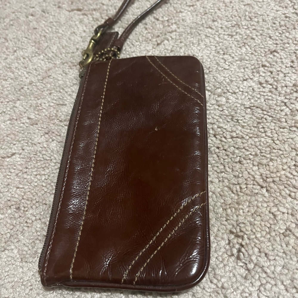 Beautiful brown leather Coach wristlet for sale!